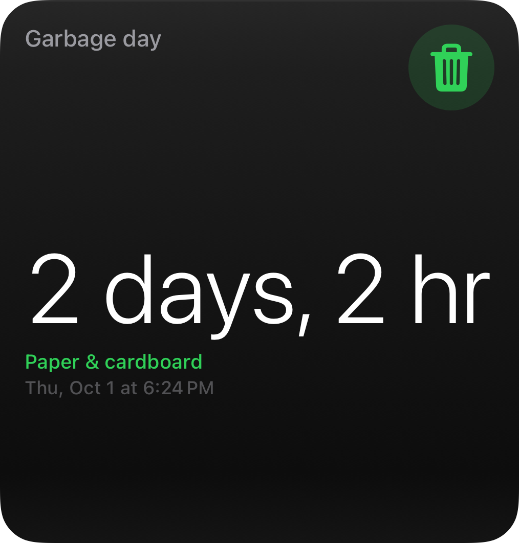 Countdown widget at the large size: a trash can chip, a large 2 days, 2 hr until garbage day, a Paper & cardboard subtitle, and the target date.